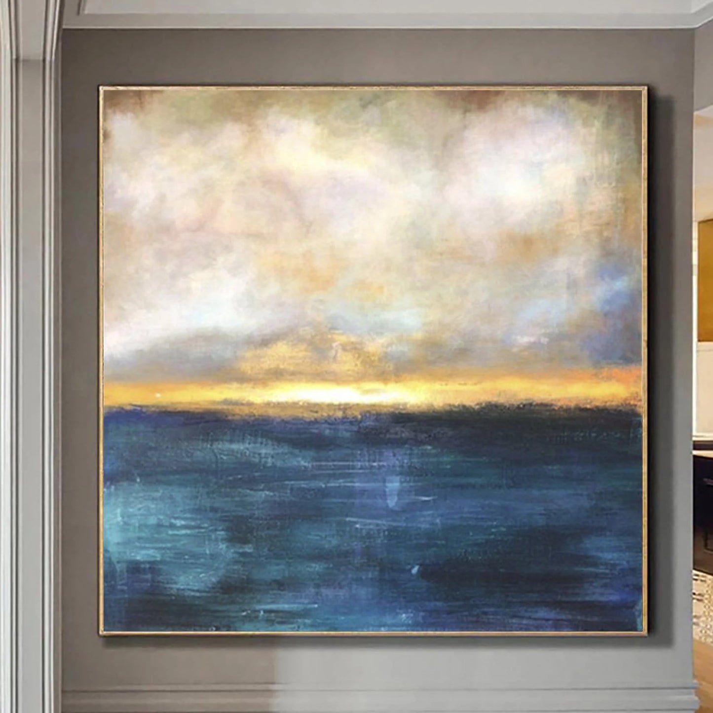 The image is a large painting depicting a serene landscape with a vast body of water and a cloudy sky.