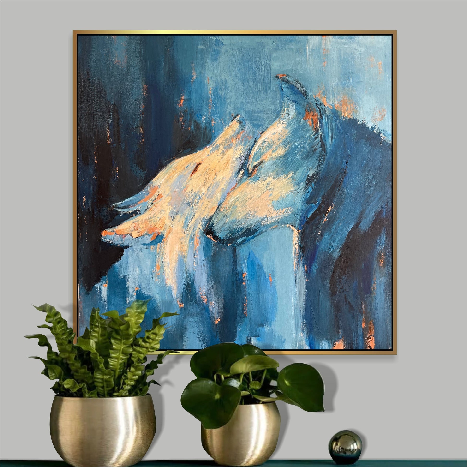 a painting of a wolf on a wall above a potted plant