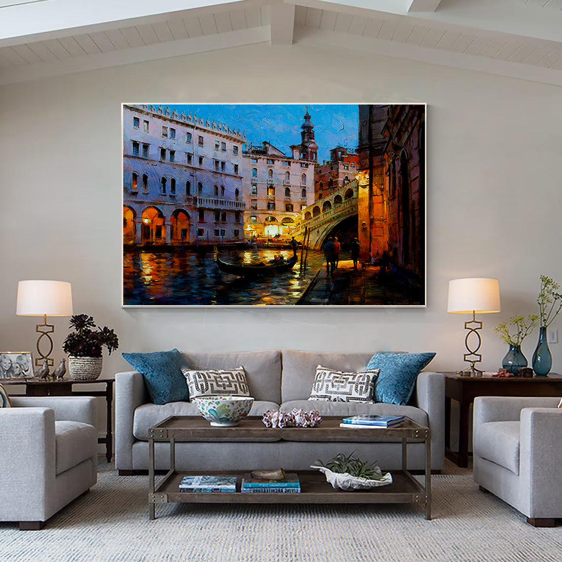 a living room filled with furniture and a painting on the wall