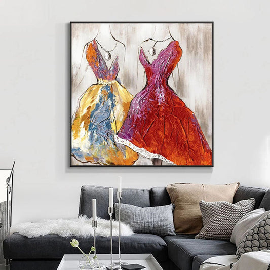 a living room with a couch and a painting on the wall