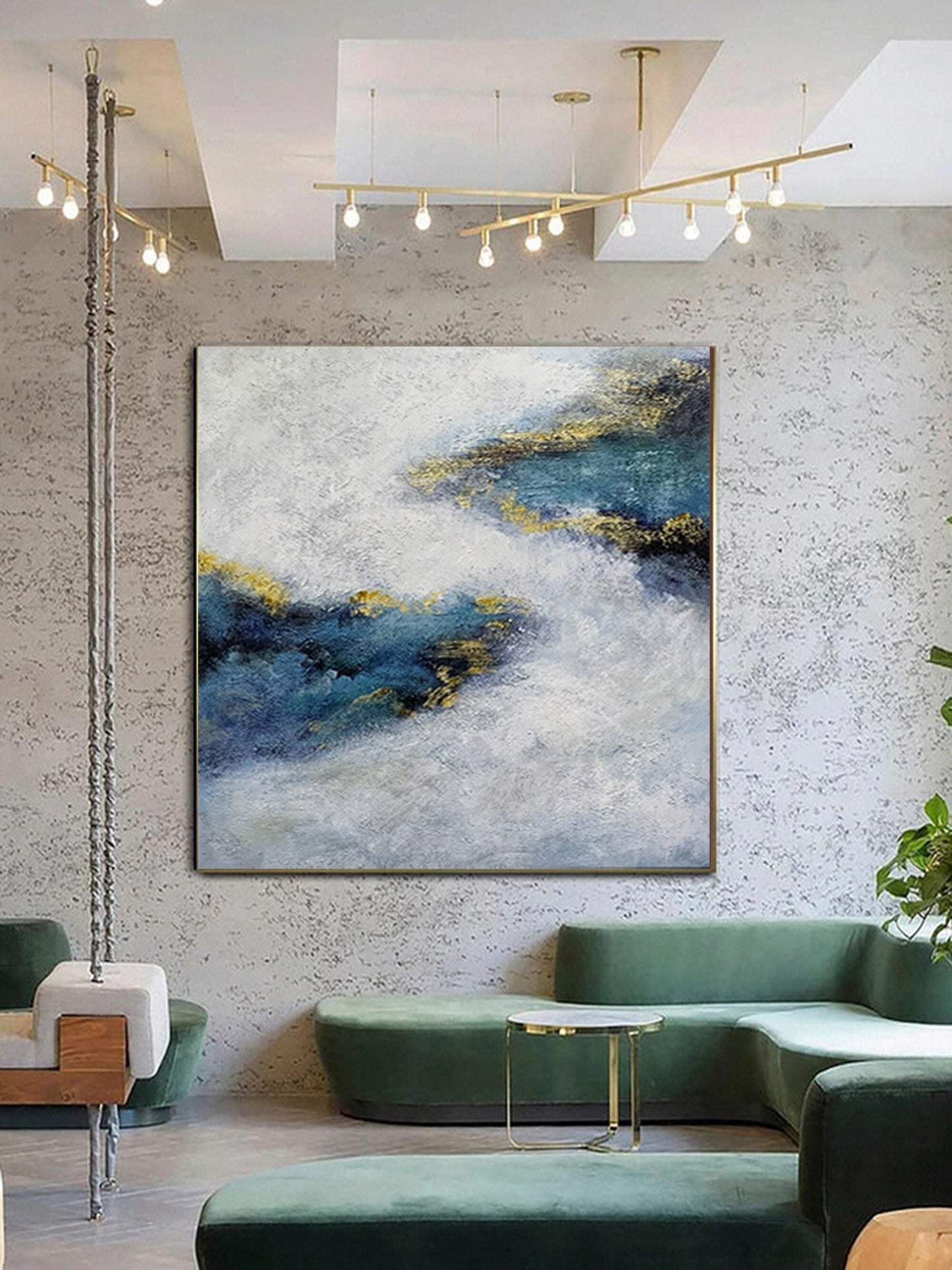 a living room filled with furniture and a painting on the wall