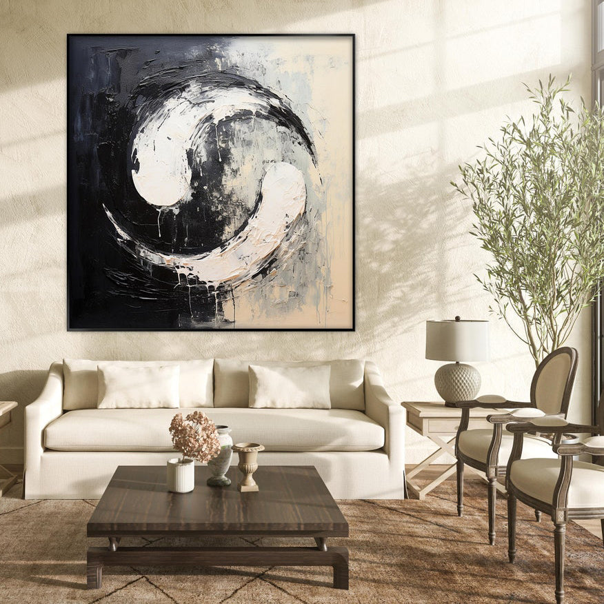 a living room filled with furniture and a painting on the wall