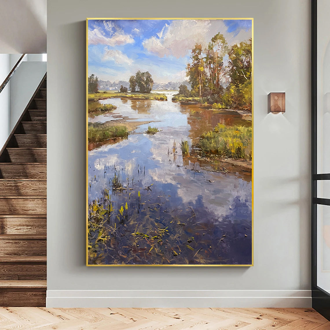 a painting hanging on a wall next to a stair case