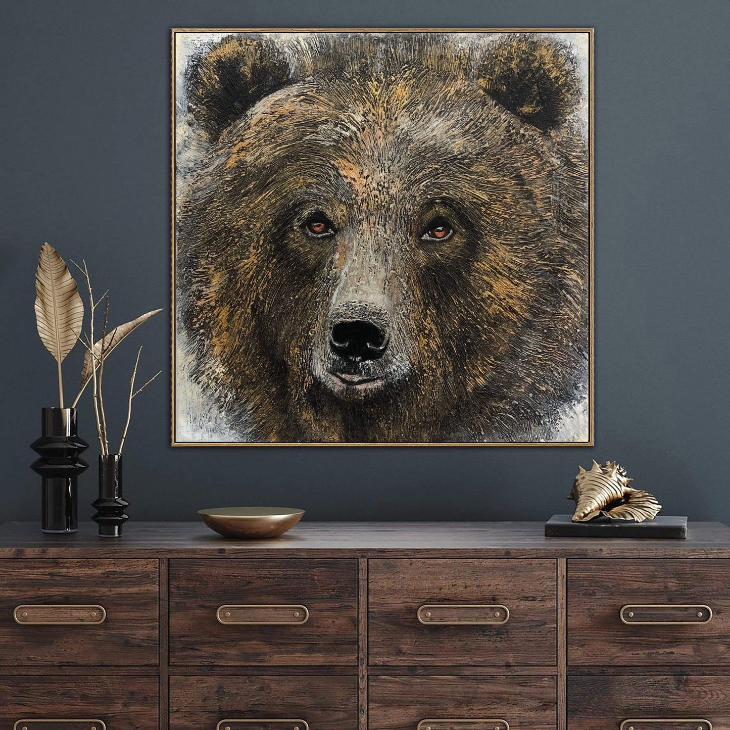 a painting of a bear on a wall above a dresser