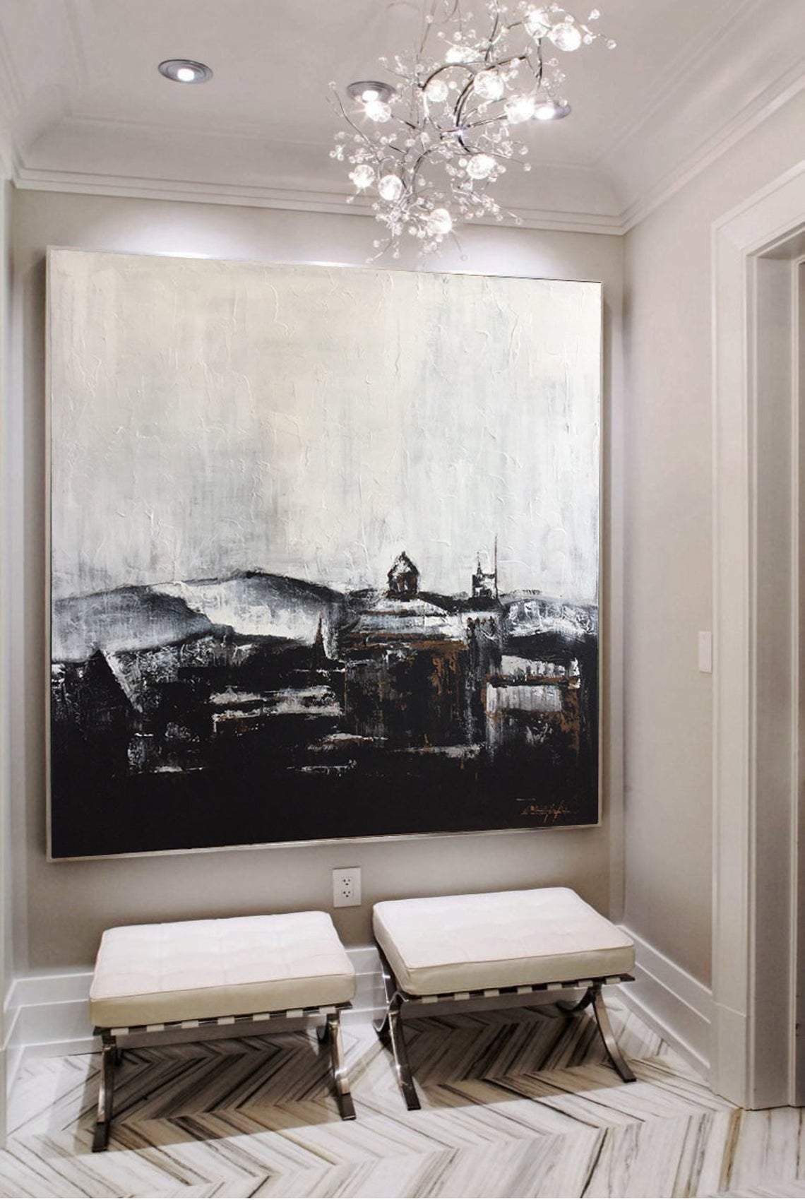 a painting hanging on a wall in a room