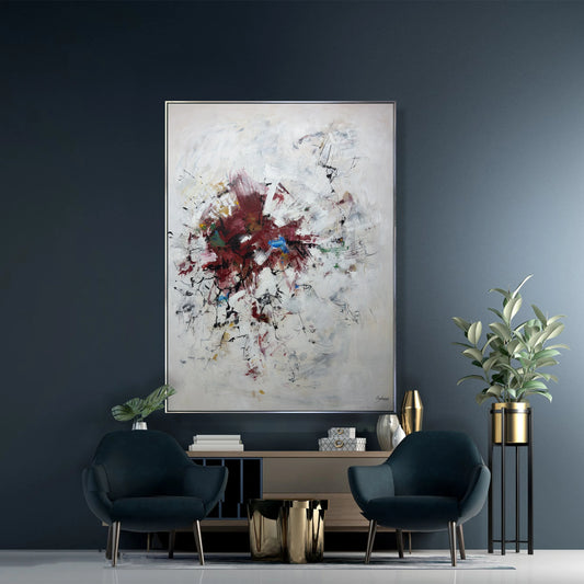a modern living room with a large abstract painting hanging on the wall, flanked by two blue armchairs. The room has a minimalist and sophisticated design, with a wooden coffee table and a potted plant adding a touch of greenery.