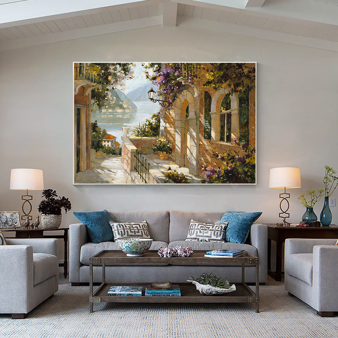 a living room filled with furniture and a painting on the wall