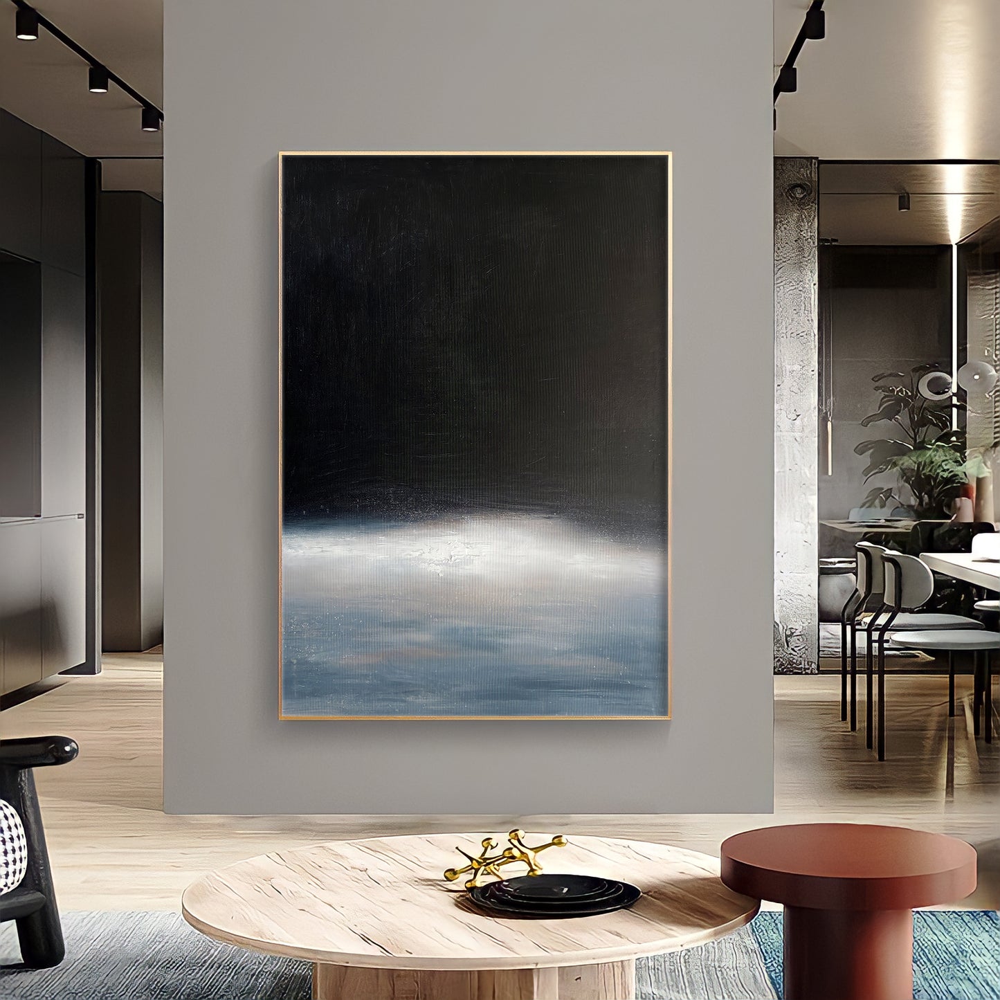 a living room with a large painting on the wall