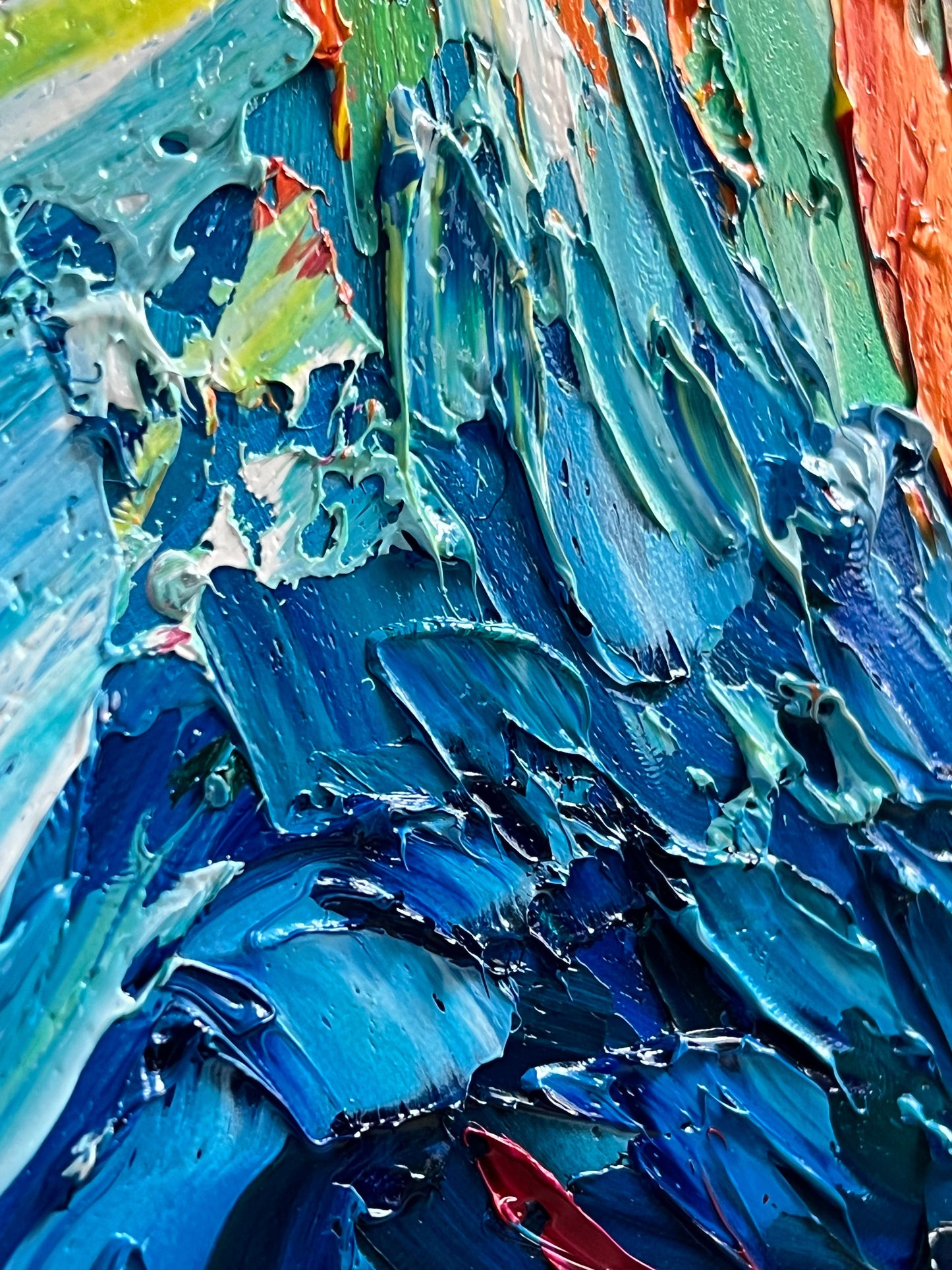 a close up of a painting of a wave