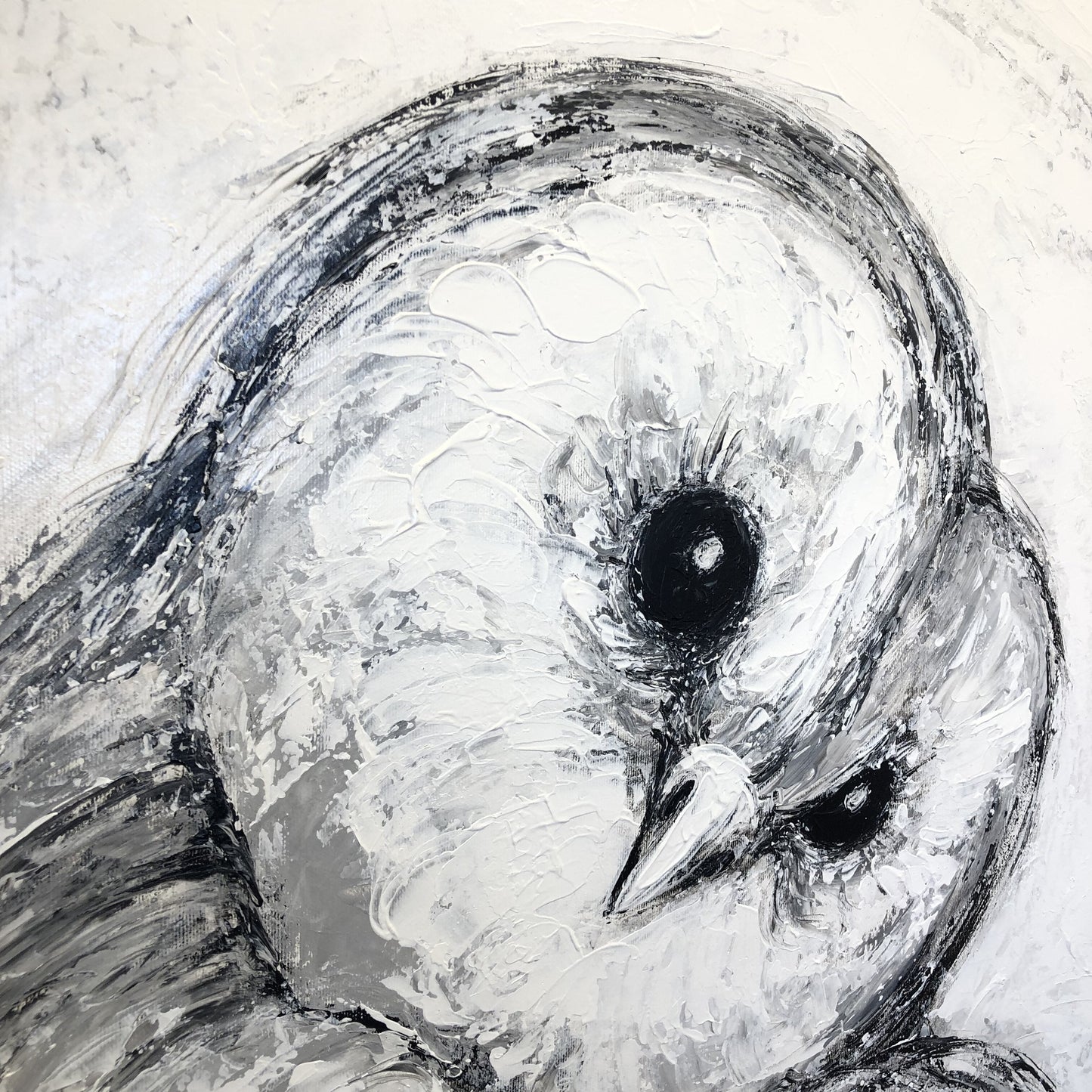 a painting of a white bird with black eyes