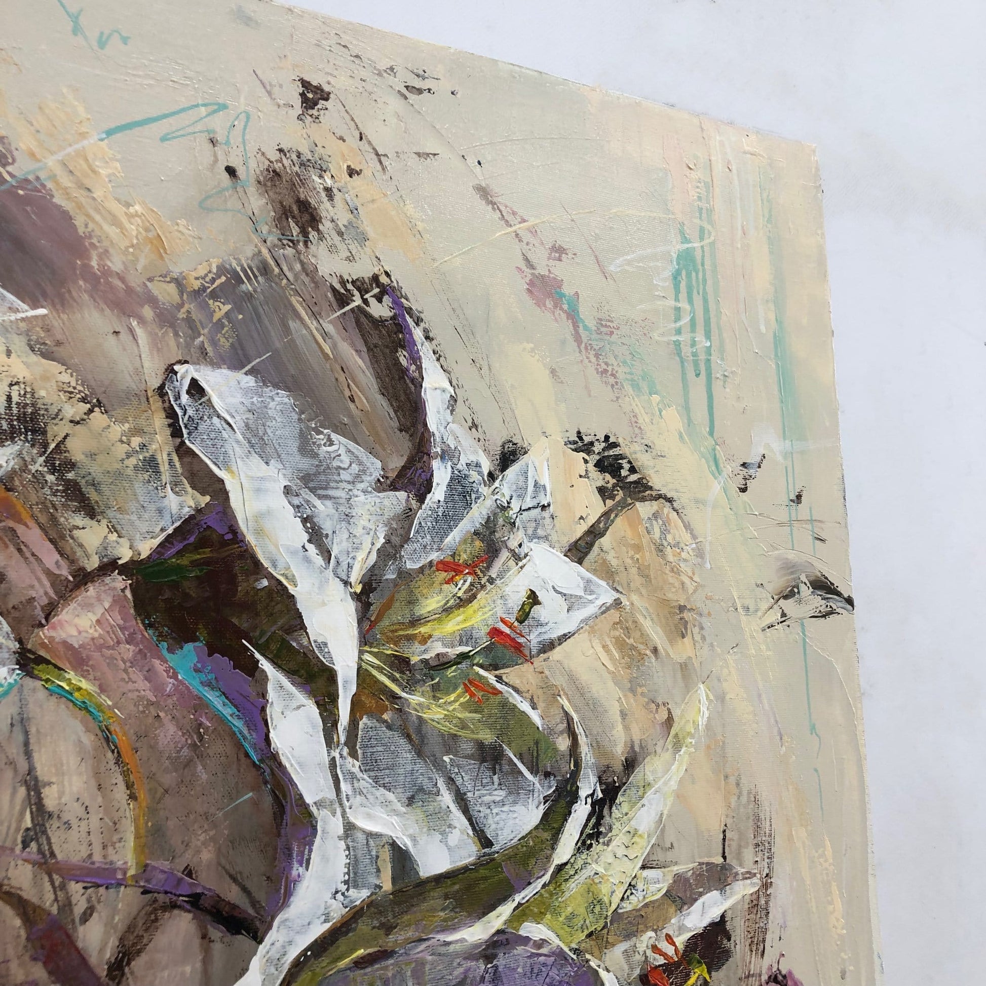 The image is an abstract painting featuring a large, colorful flower with various brushstrokes and splatters of paint.