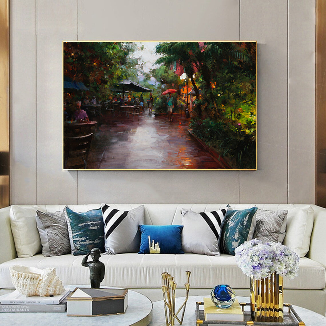 a living room filled with furniture and a painting on the wall