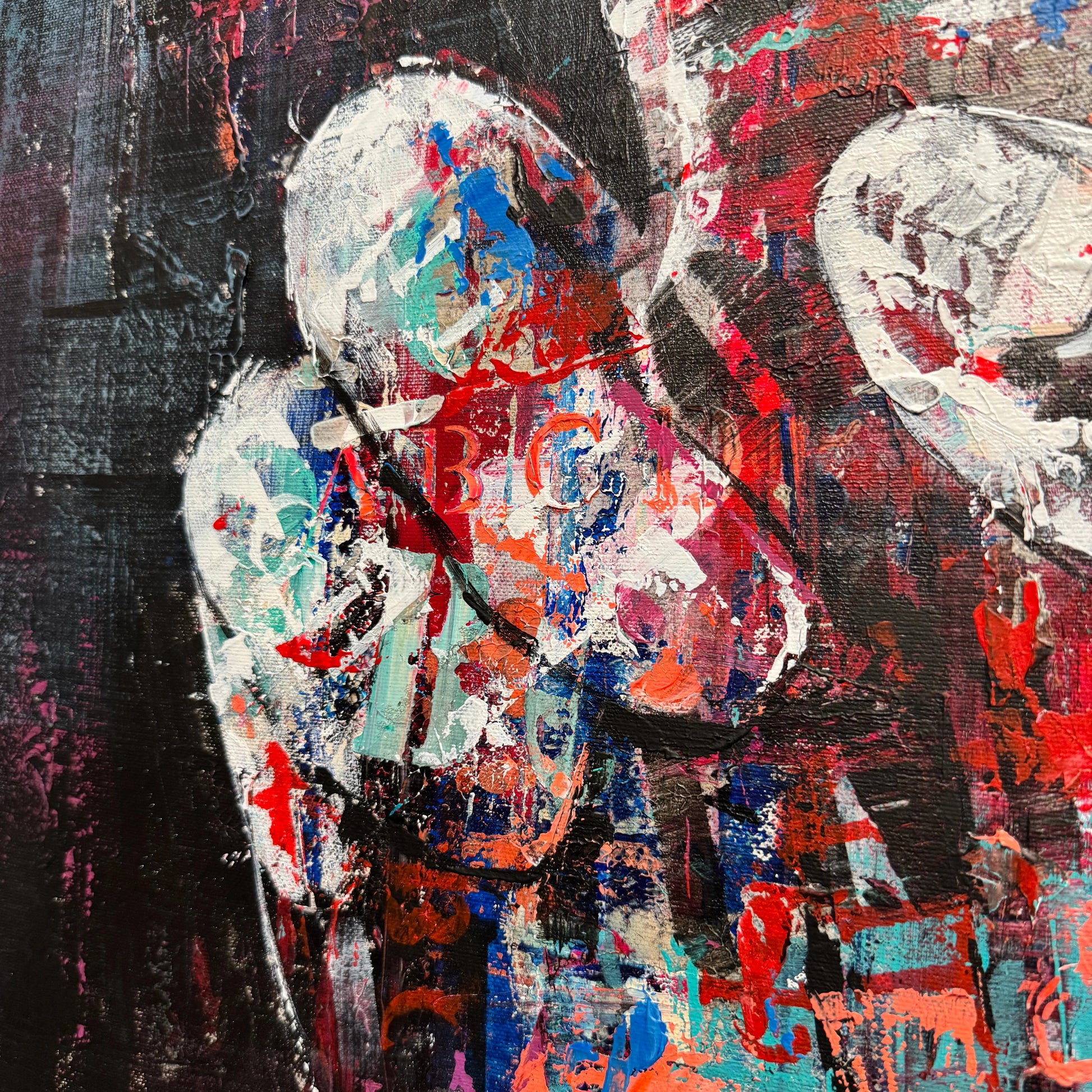 The image is a vibrant, abstract painting with bold colors and dynamic brushstrokes. The painting features a mix of red, blue, green, and white colors, creating a visually striking and energetic composition. The artist has used a variety of techniques and styles to create this dynamic artwork, resulting in a captivating and engaging visual experience.
