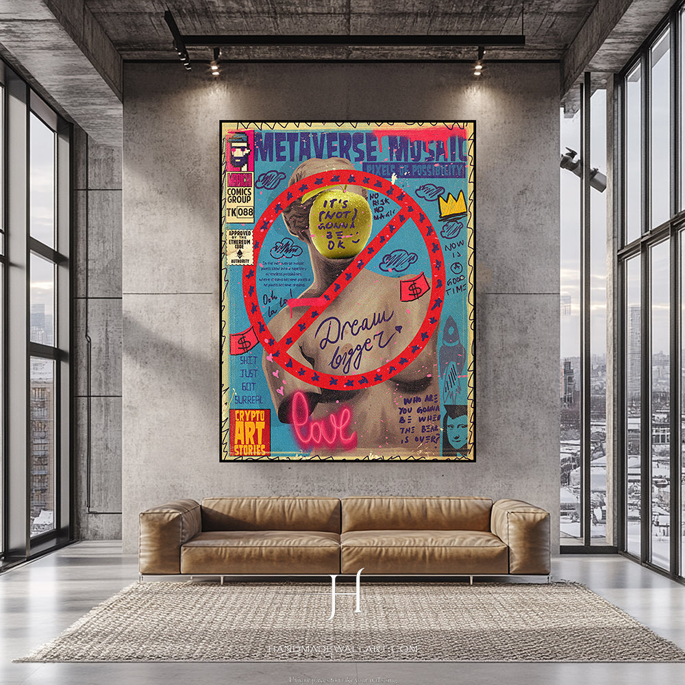 a living room with a couch and a poster on the wall
