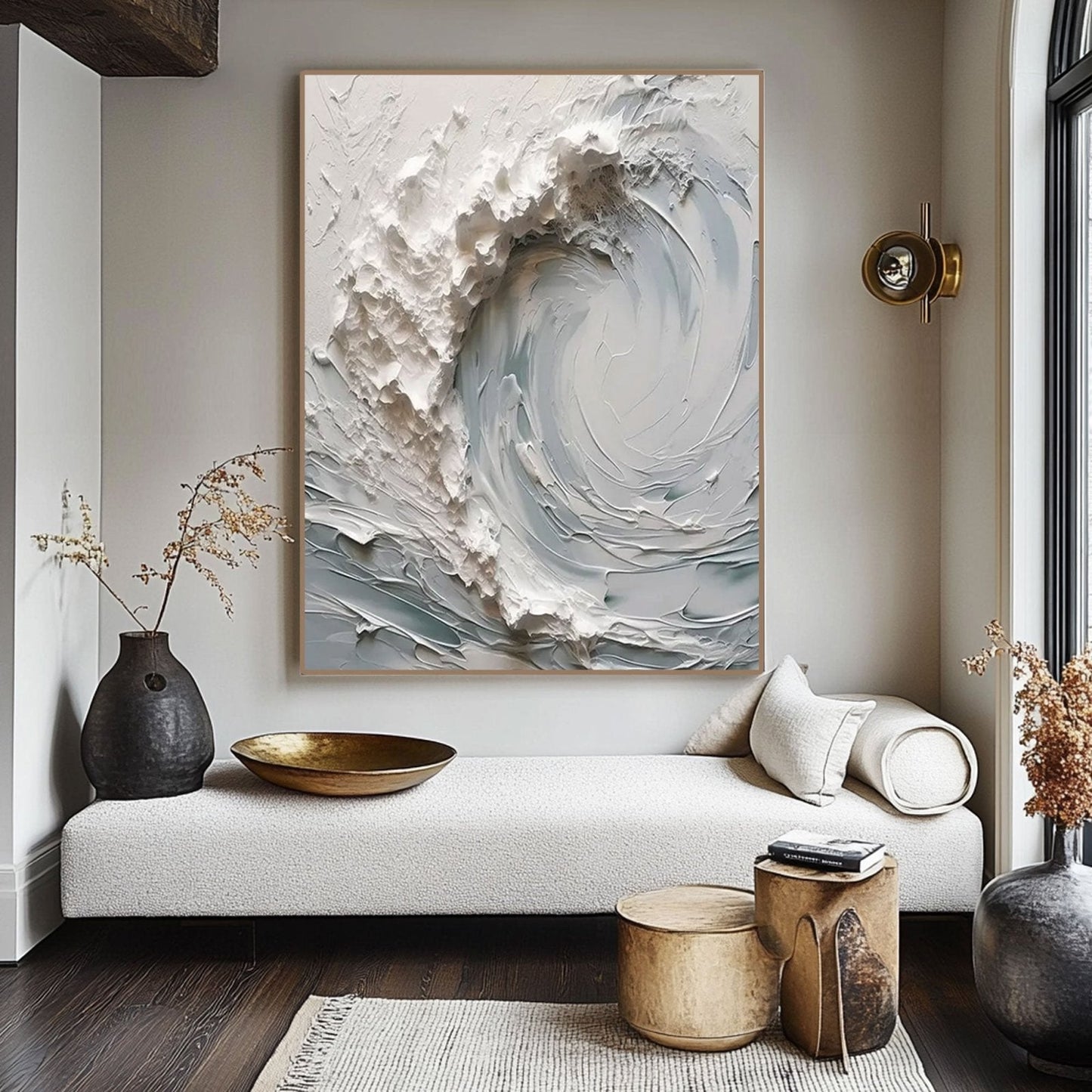 a modern living room with a large abstract painting of a wave on the wall, a white sofa, and various decorative elements such as a vase, a bowl, and a plant.