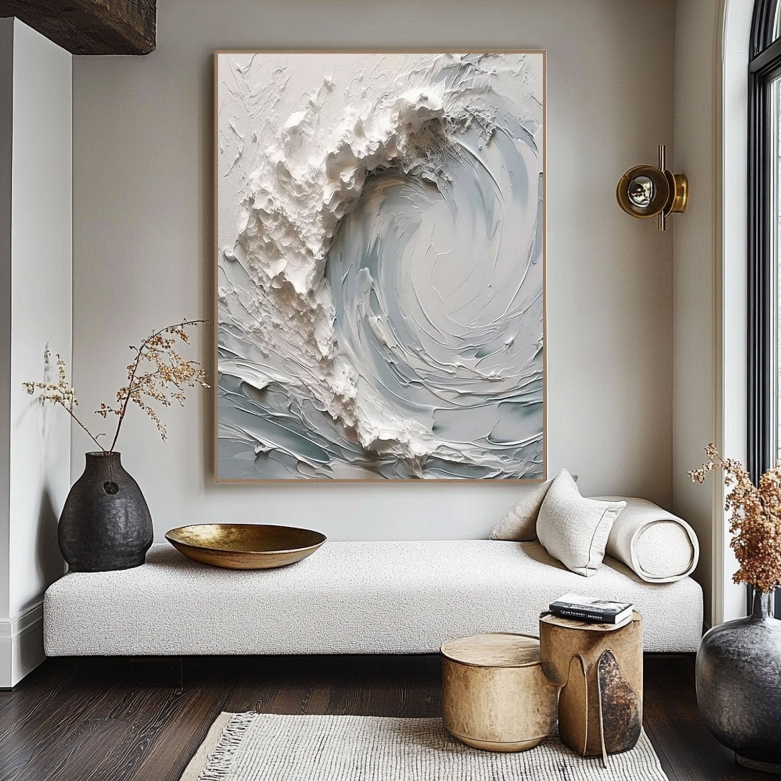 a modern living room with a large abstract painting of a wave on the wall, a white sofa, and various decorative elements such as a vase, a bowl, and a plant.