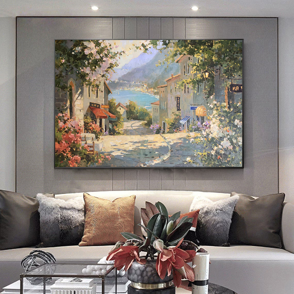 a living room filled with furniture and a painting on the wall