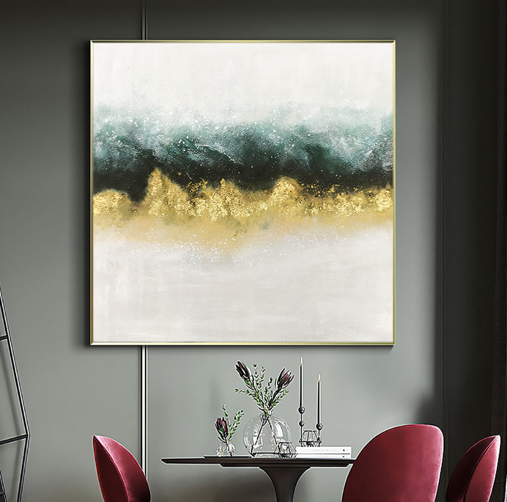 a painting hanging on a wall above a table