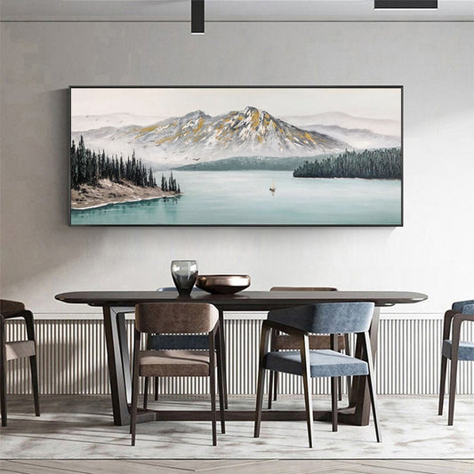 a dining room with a painting on the wall