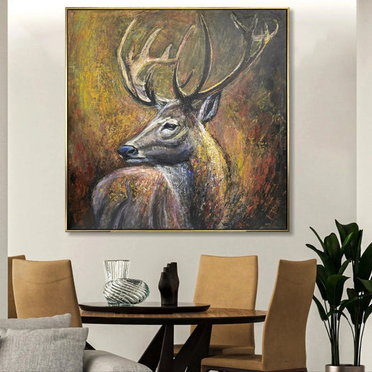 a large painting of a deer with antlers hanging on a wall above a wooden dining table with four chairs.