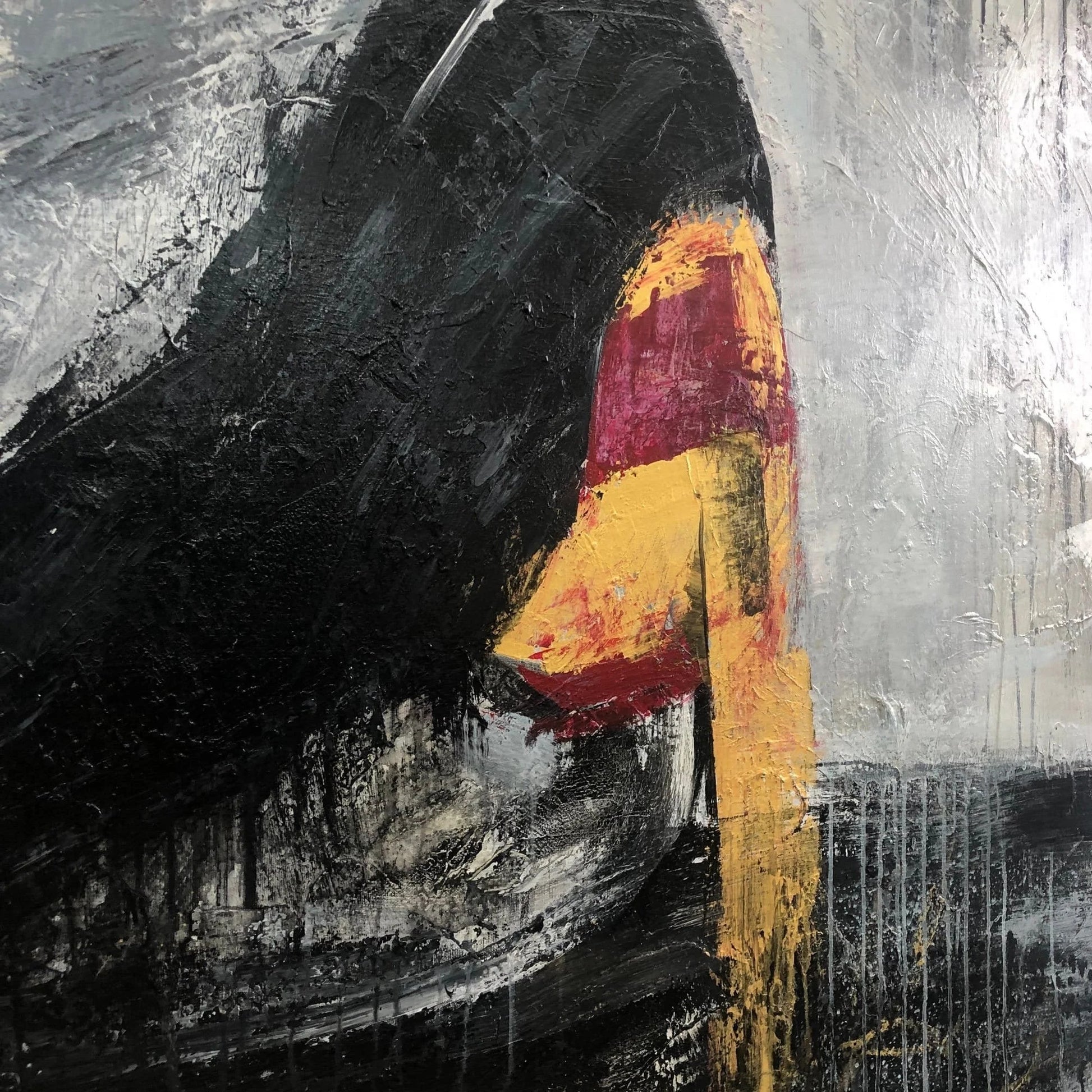 The image is an abstract painting with bold brushstrokes in black, red, and yellow colors. The painting features a mix of dark and light areas, creating a dynamic and visually striking composition.