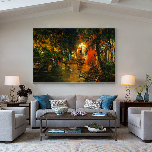 a living room filled with furniture and a painting on the wall