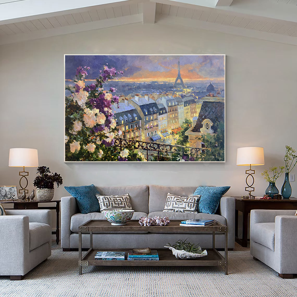 a living room filled with furniture and a painting on the wall