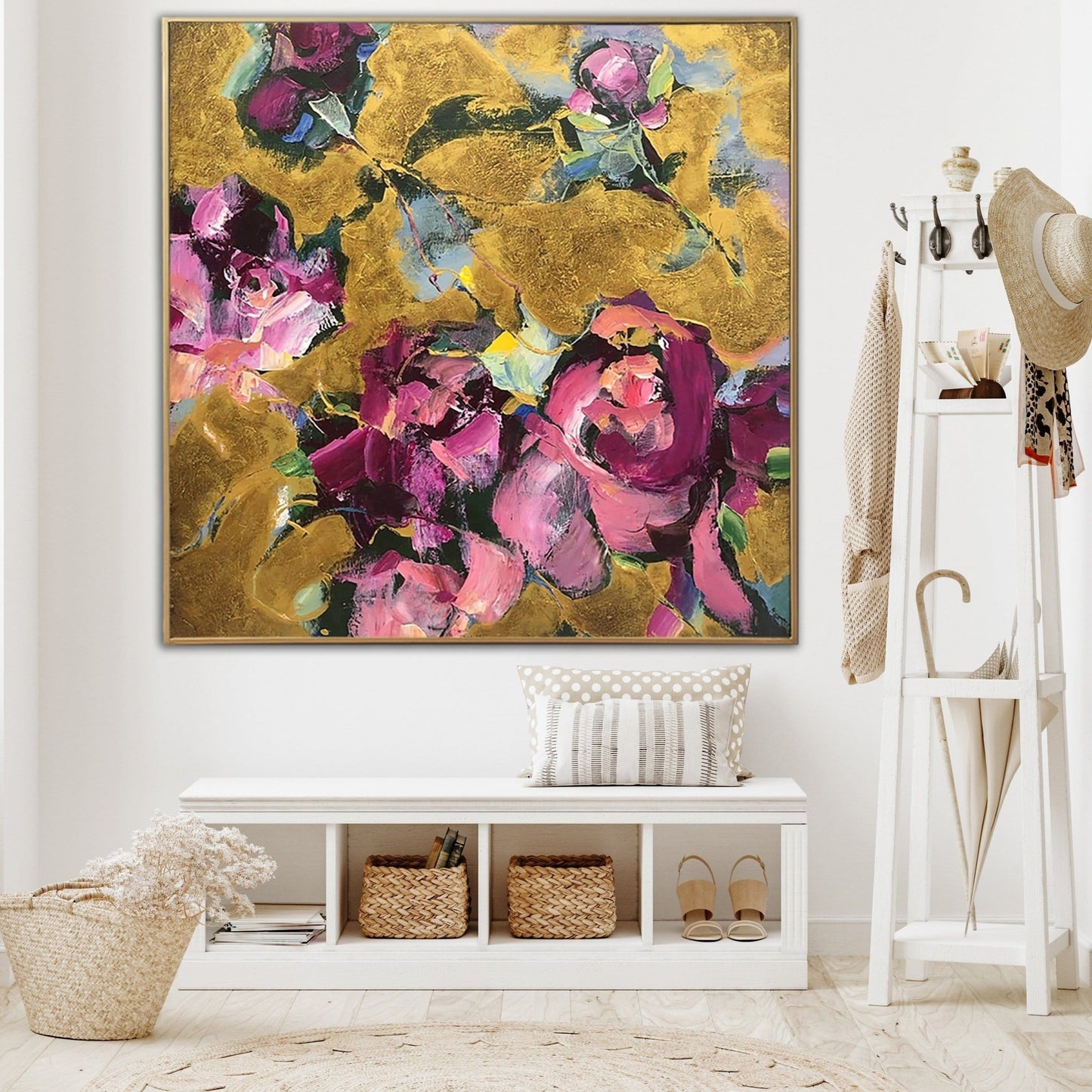 a large, colorful painting of flowers hanging on a wall in a room with a white bench, a shelf with baskets, and a hat rack.