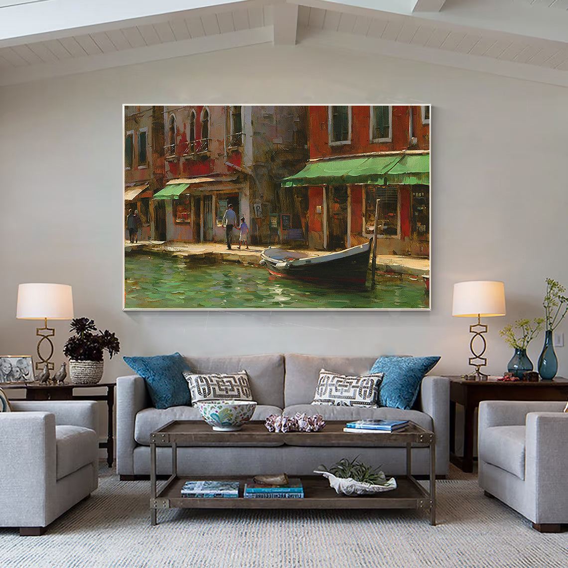 a living room filled with furniture and a painting on the wall