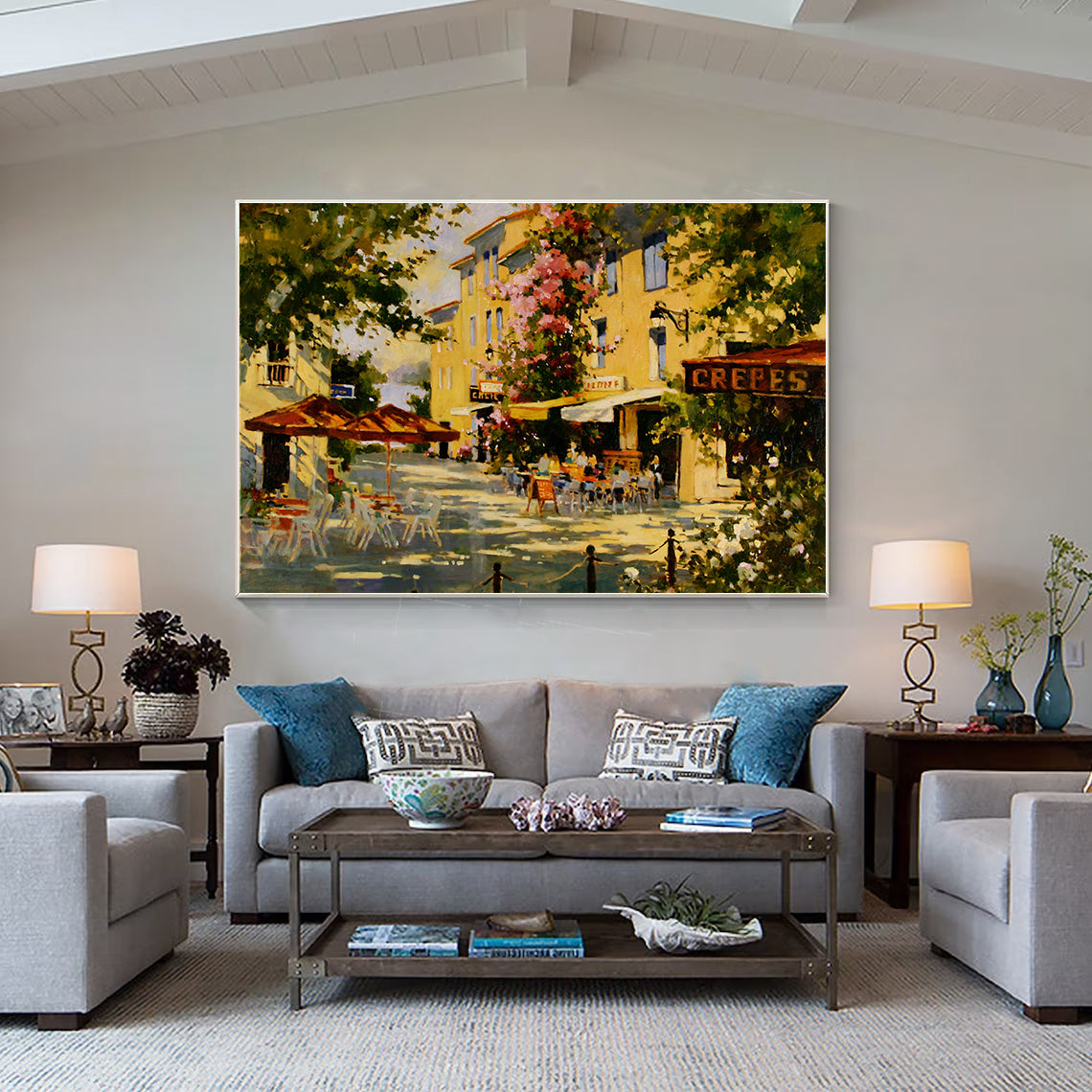 a living room filled with furniture and a painting on the wall