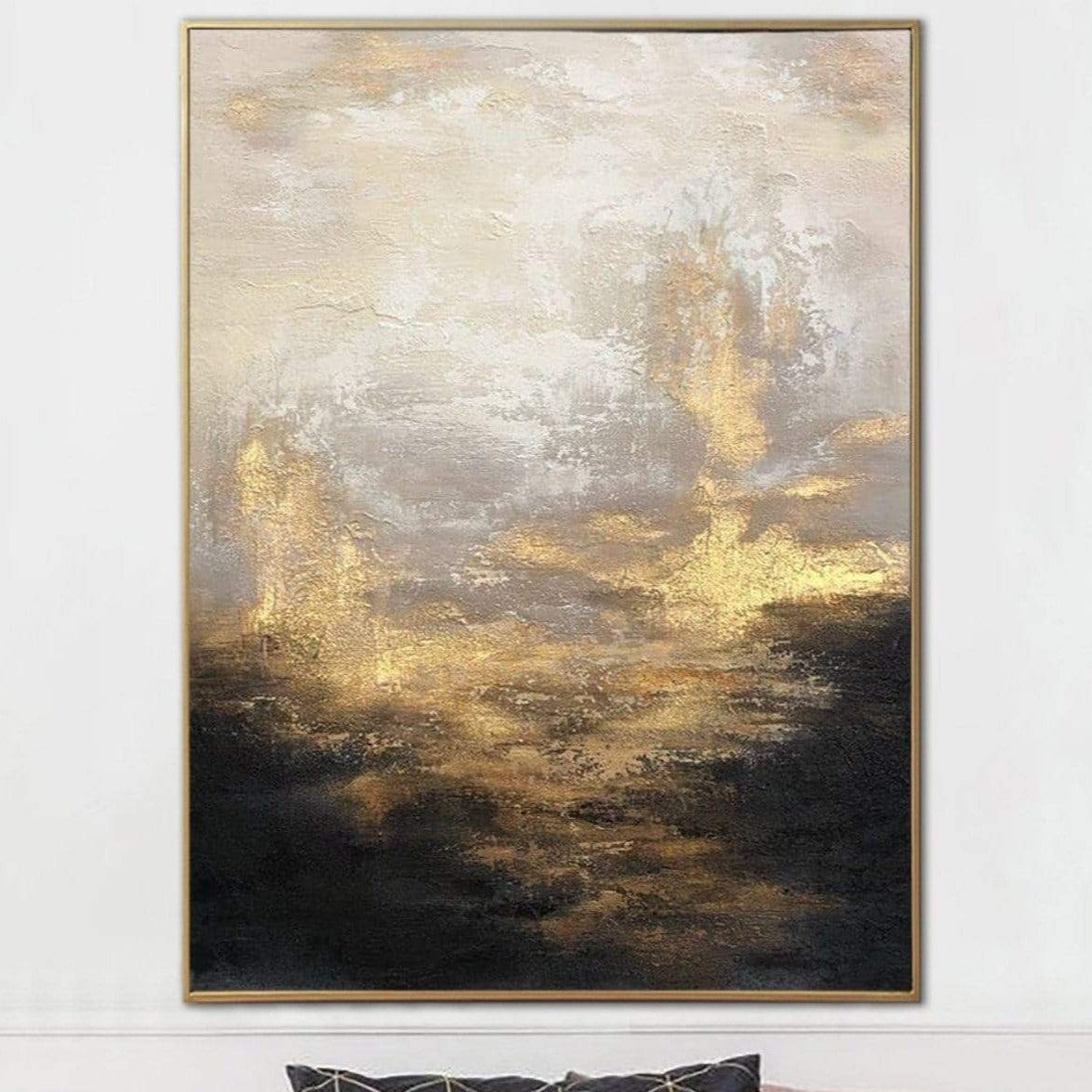 a painting hanging on a wall above a couch