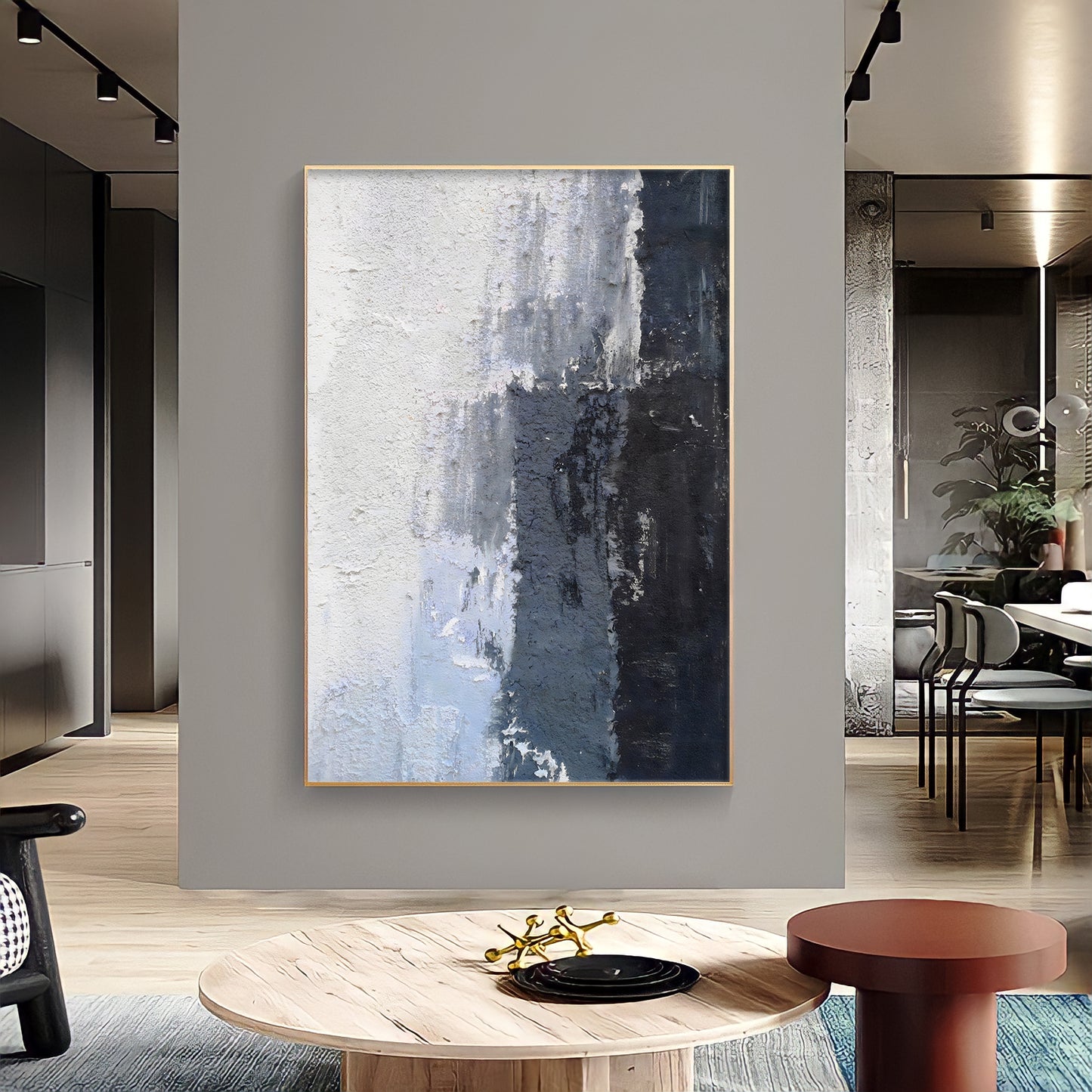 a painting hanging on a wall in a living room