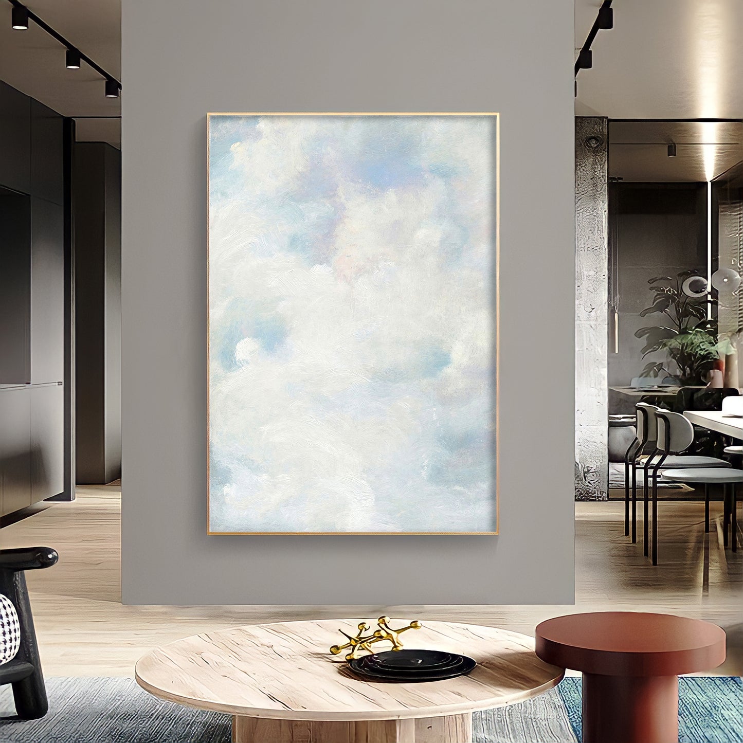 a painting hanging on a wall in a living room