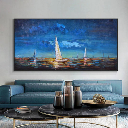 a living room with a blue couch and a painting on the wall