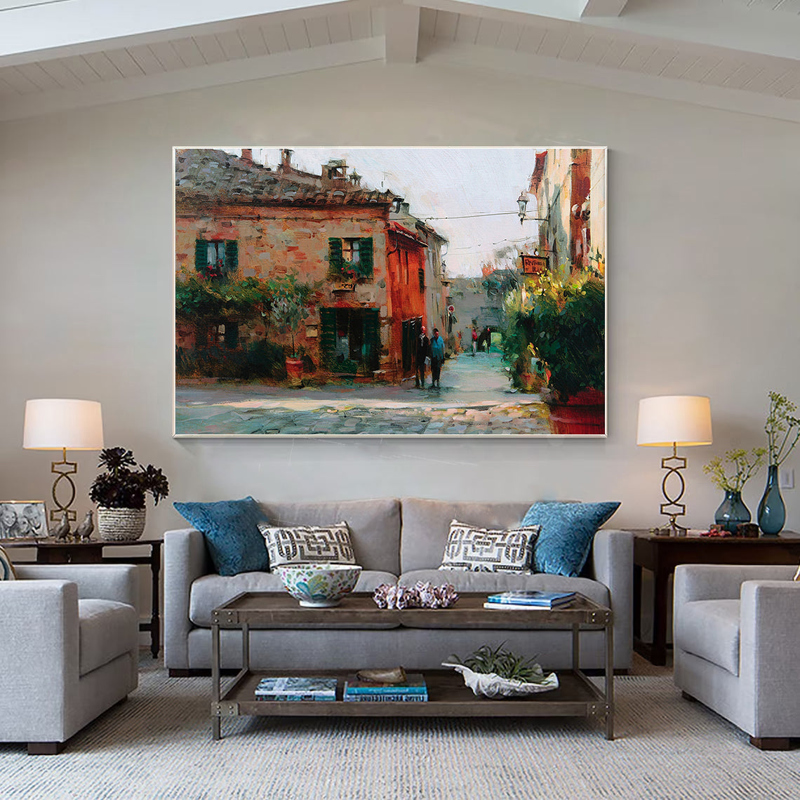 a living room filled with furniture and a painting on the wall