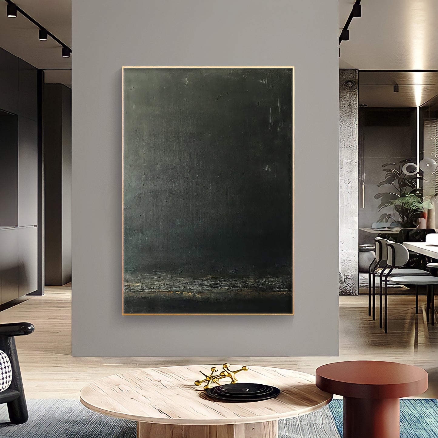 a living room with a large painting on the wall