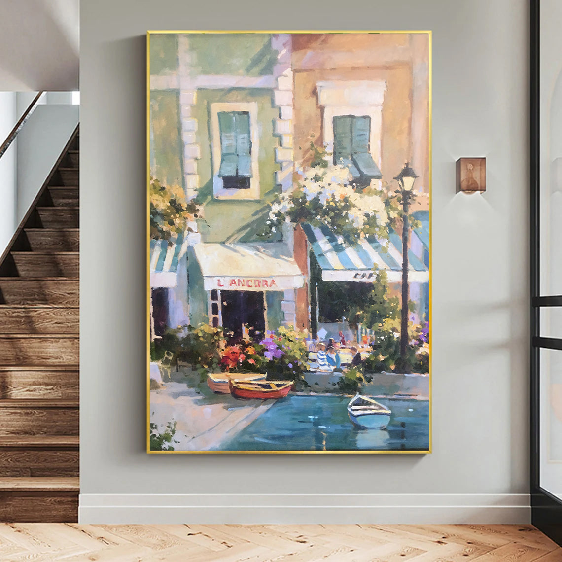 a painting hanging on a wall next to a stair case