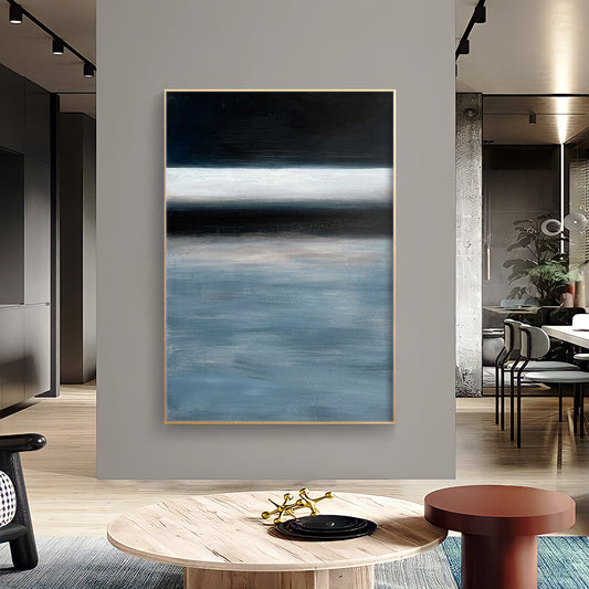 a painting hanging on a wall in a living room