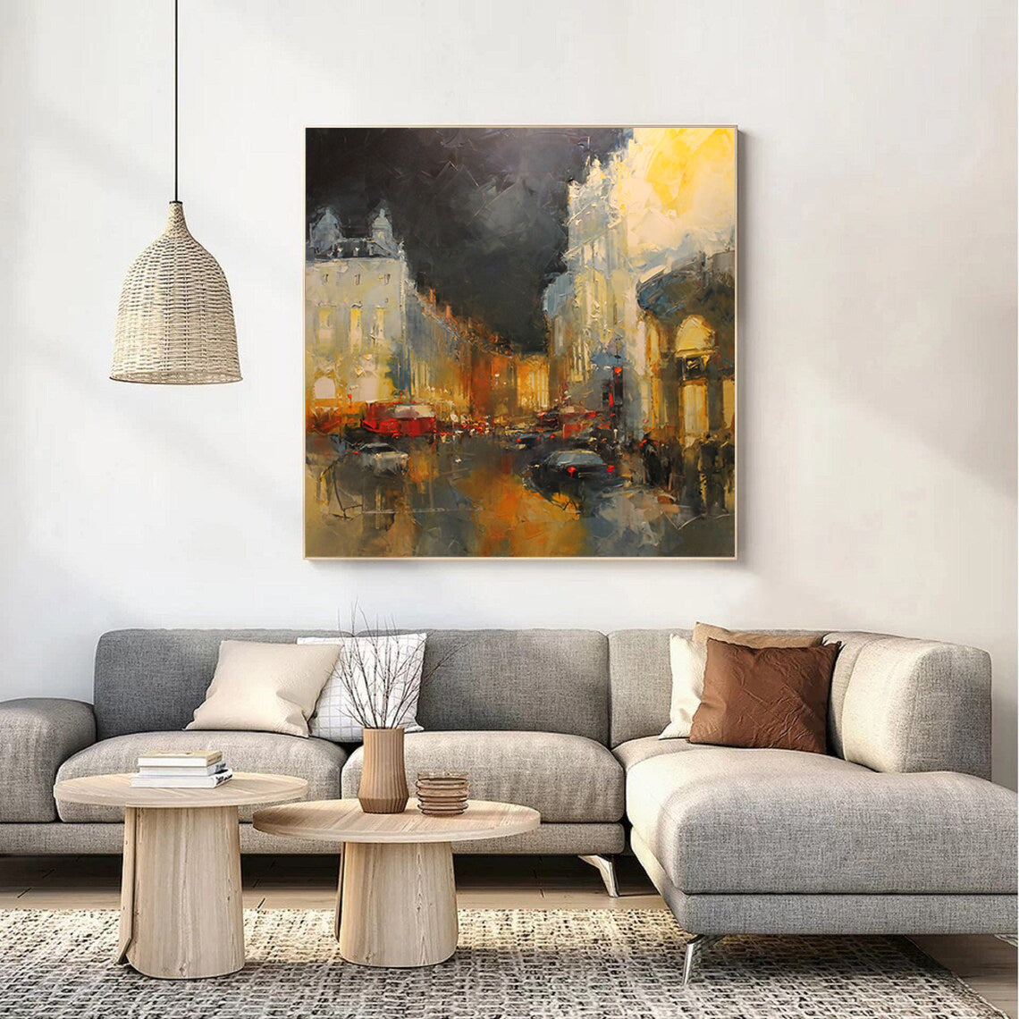 a living room with a large painting on the wall