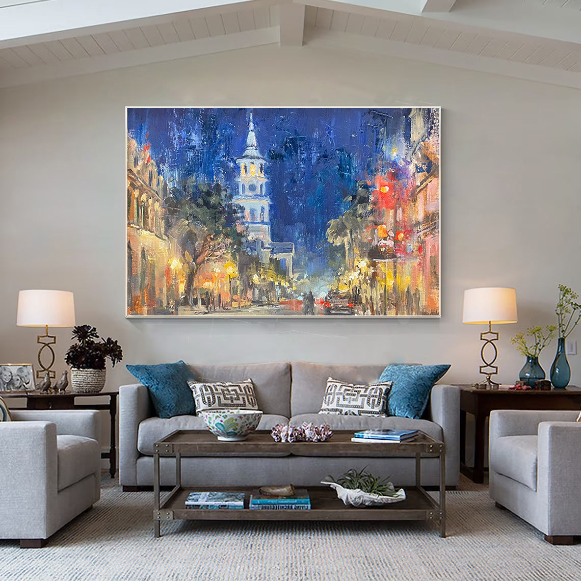 a living room filled with furniture and a painting on the wall