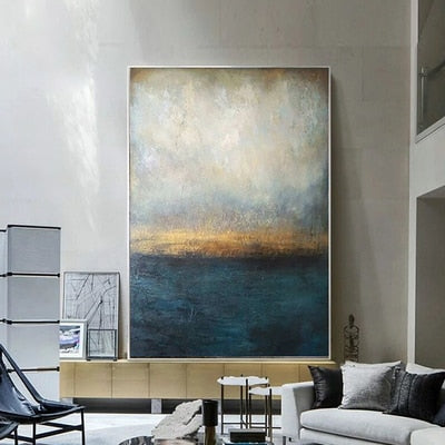 a living room filled with furniture and a large painting