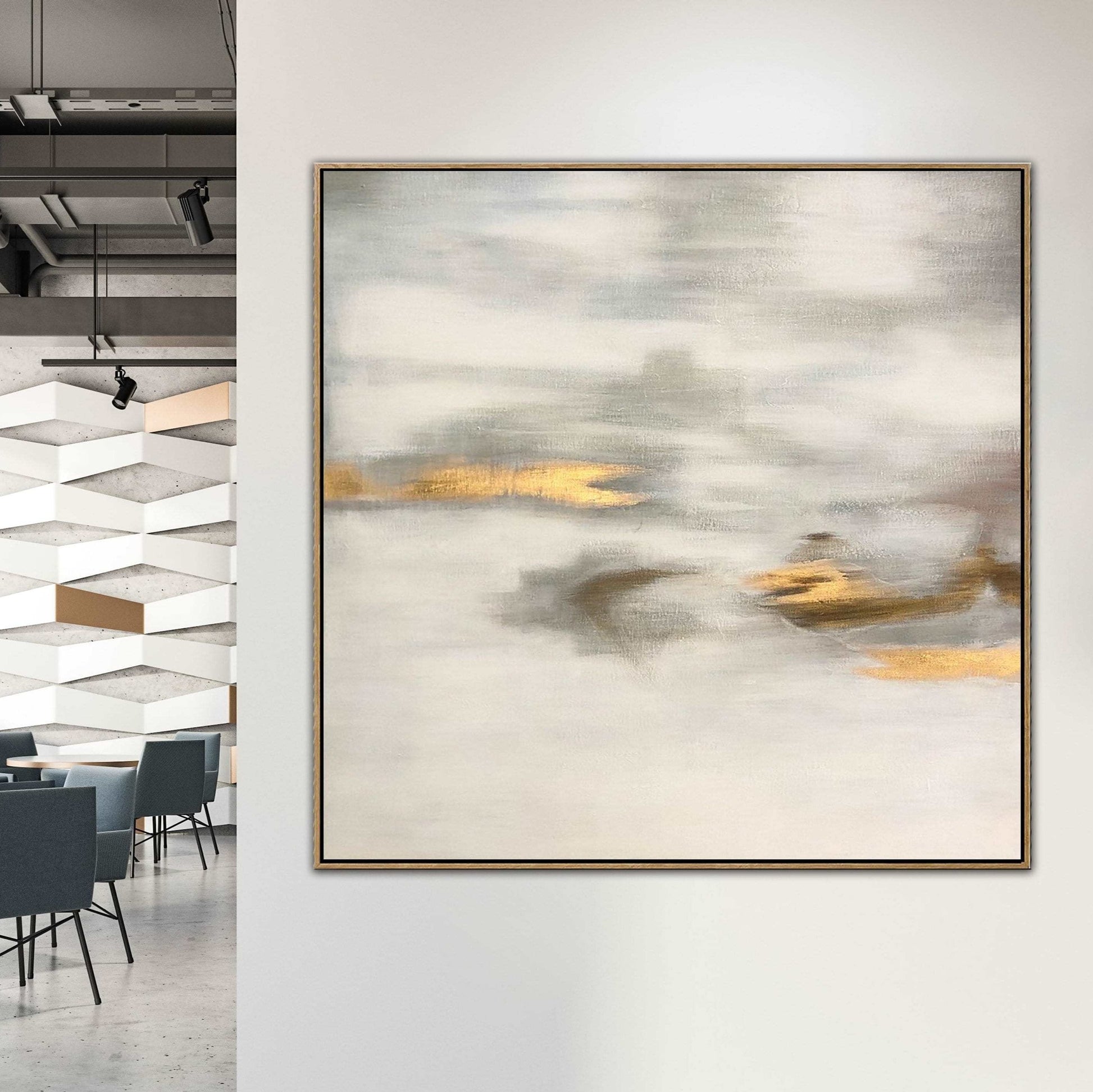 a large abstract painting hanging on a wall, with a modern interior design visible in the background.