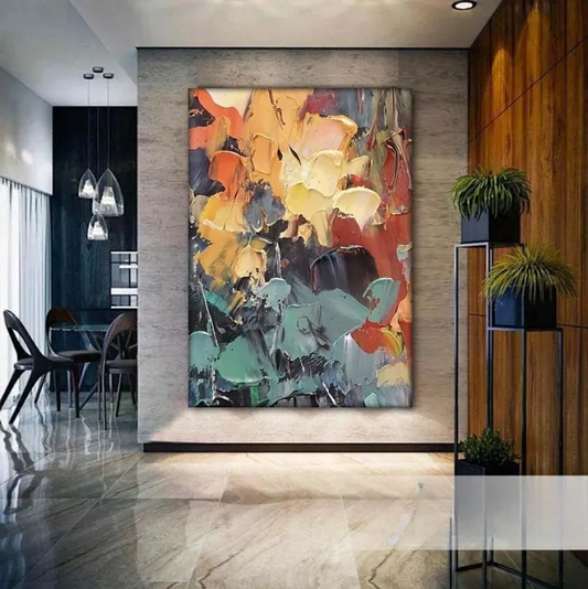 a modern and stylish interior design with a large abstract painting as the focal point. The painting is displayed on a wall, surrounded by various decorative elements such as potted plants and a dining table. The overall aesthetic of the space is contemporary and visually appealing.