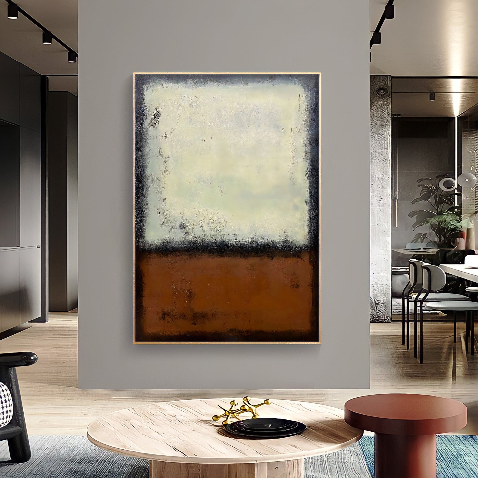 a painting hanging on a wall in a living room