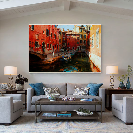 a living room filled with furniture and a painting on the wall