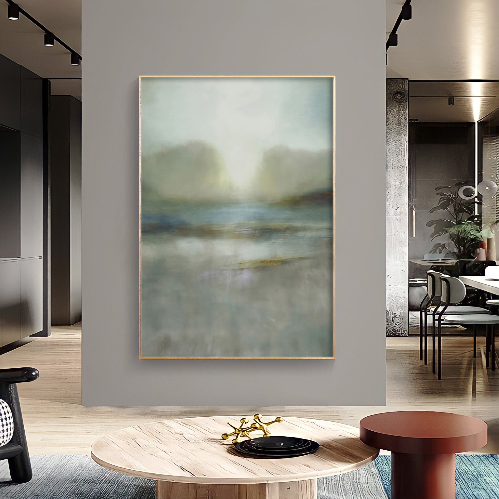 a painting hanging on a wall in a living room