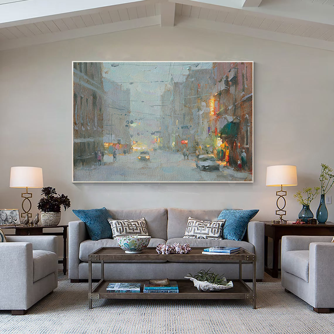 a living room filled with furniture and a painting on the wall