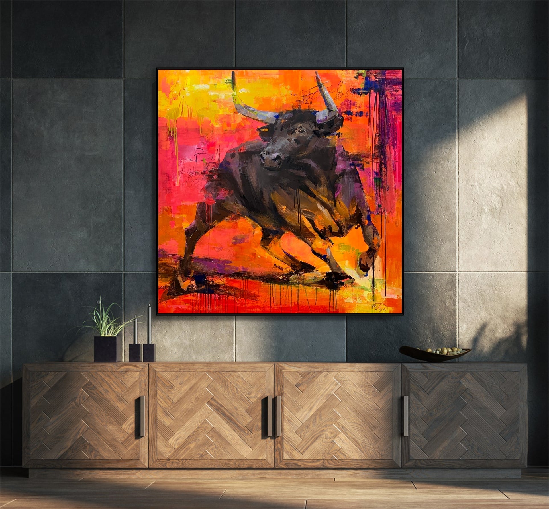 a painting of a bull on a wall