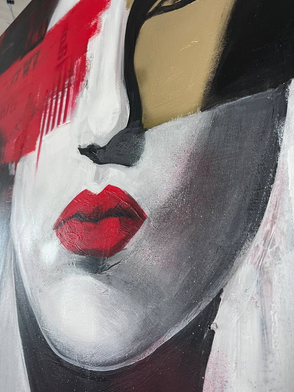 a painting of a woman's face with red lips