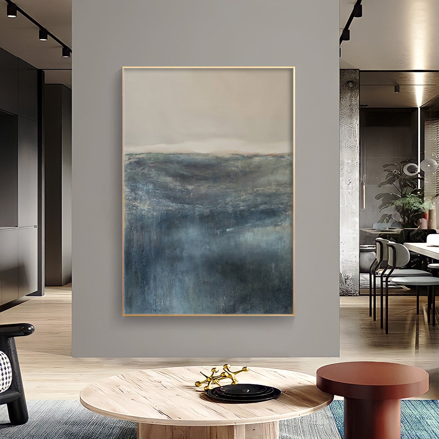 a painting hanging on a wall in a living room